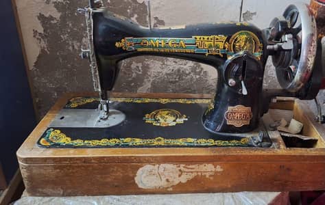 Omega Sewing Machine