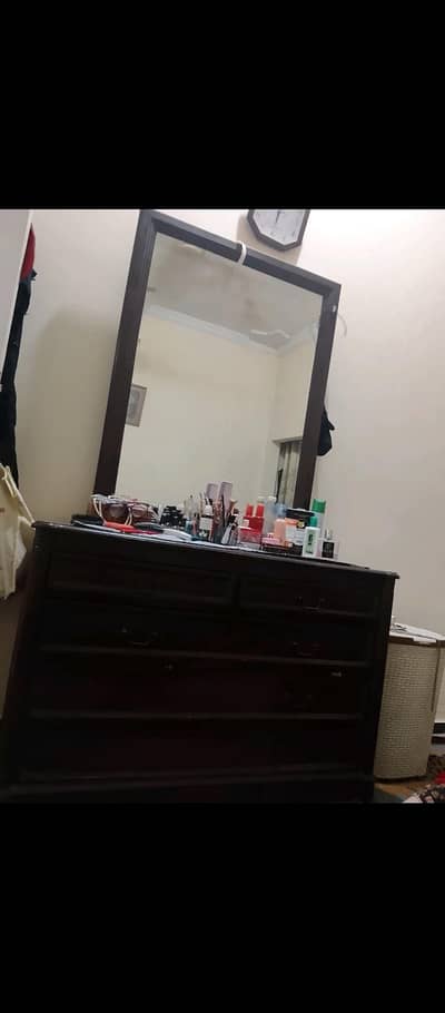 a wooden dressing table