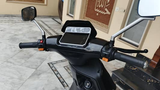 new eveeon electric scooty