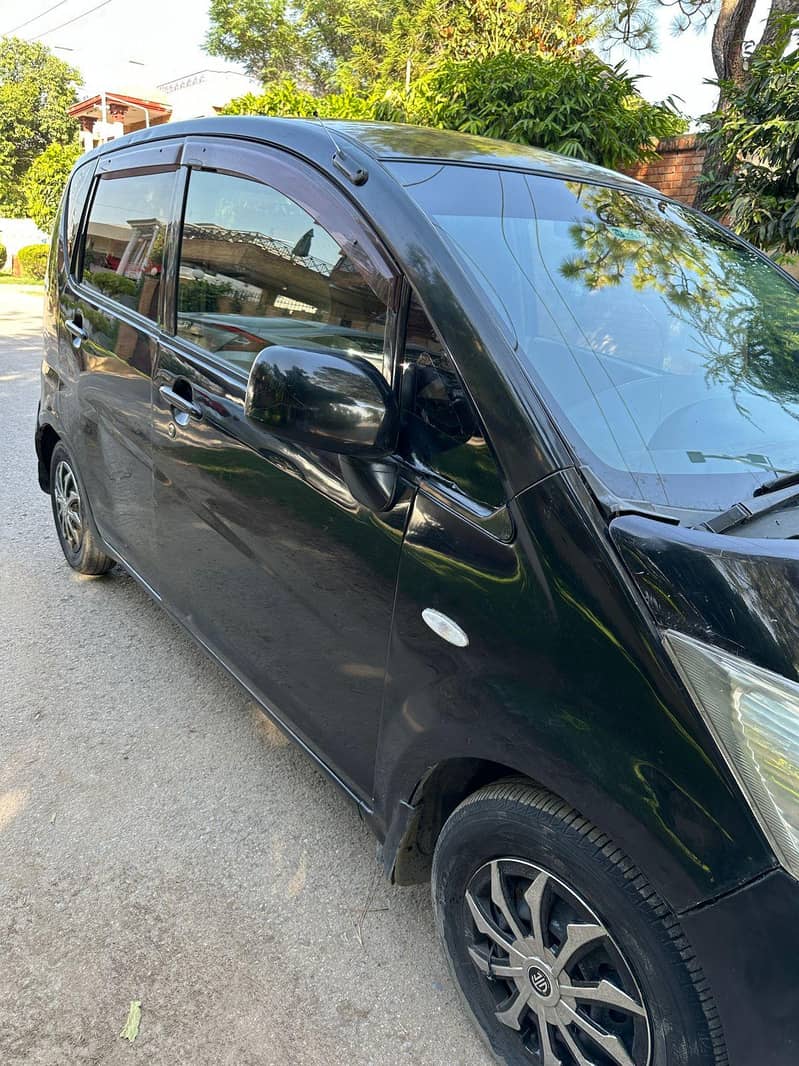 Daihatsu Move (with Eco function) 6