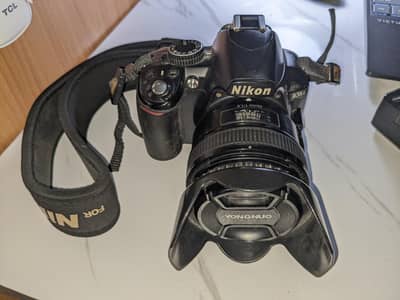 Nikon D3100 with Yongnuo 50mm lens