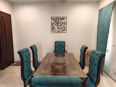 Brown and blue wooden dining table 6 seater.