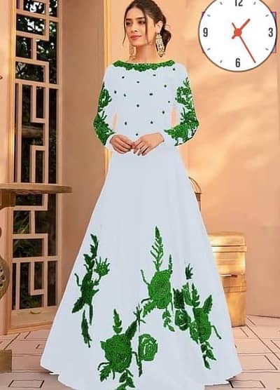 white silk Maxi suit with green floral embroidered for Eid and wedding