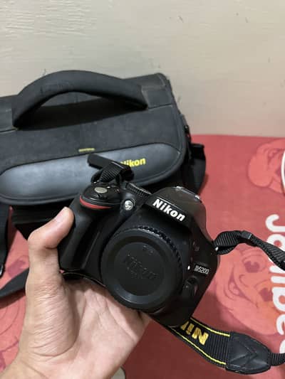 Nikon D5200 with travel lens all purpose zoom