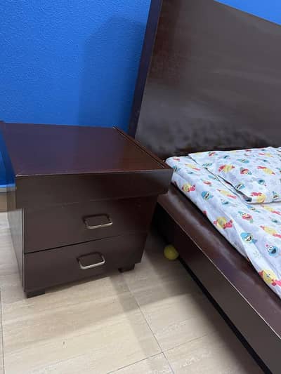 single wooden bed with mattress and side table. excellent condition