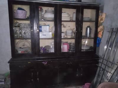 Wooden crockery showcase fir sale good condition.