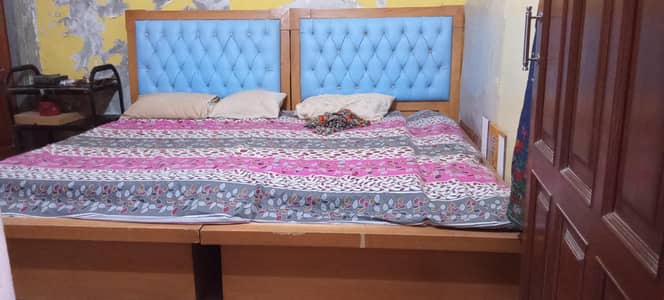 2 single bed wood in a good condition