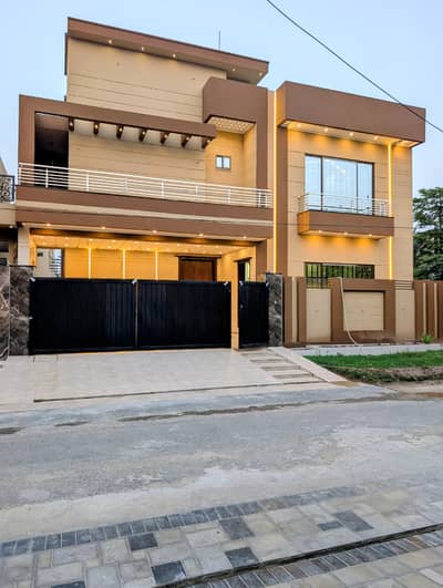 10 Marla Brand New Ultra-Modern Double Unit House For Sale Prime Location Near Wapda Town