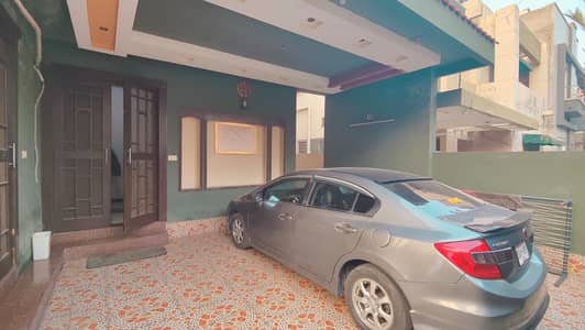 10 Marla Tile Flooring Beautiful Owner Build Solid House Super Hot Location All Original Picture attached With Direct Owner Available For Sale in Abdalian Cooperative Society.