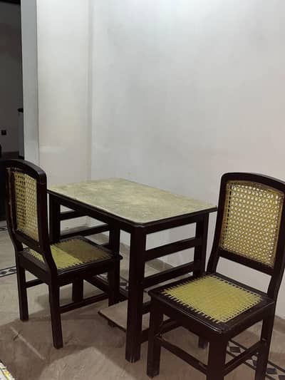 table with two chairs