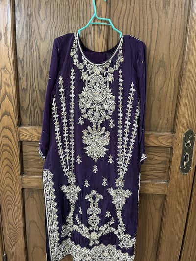 Embroidered and embellished dress
