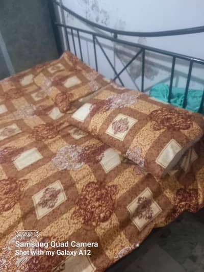 rod iron bed & dressing