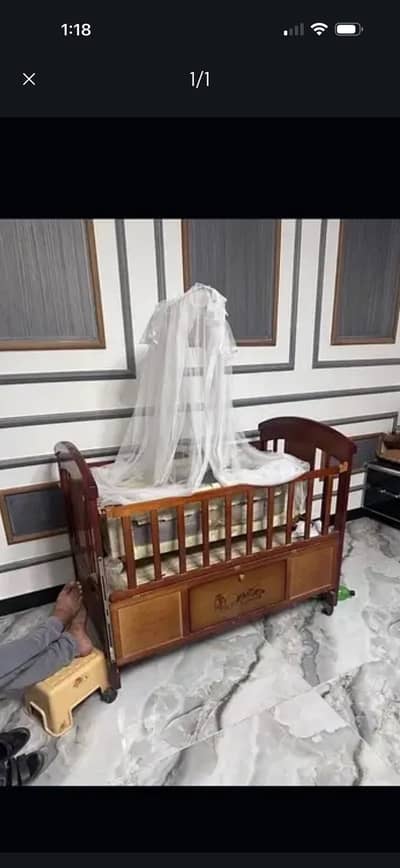 Wooden baby coat with storage and swing
