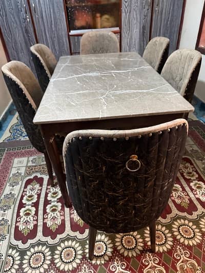 6 sitter dining table with 6 luxry chairs marble top good quality
