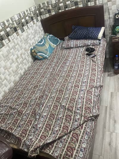 Bed and side table