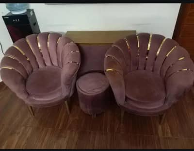 2 chairs with center table
