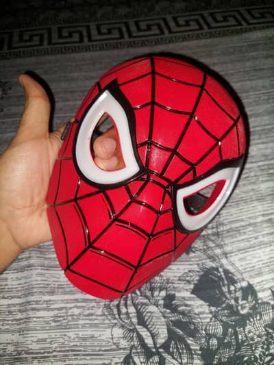 spiderman hard  plastic mask with  ( light eyes ) brand new