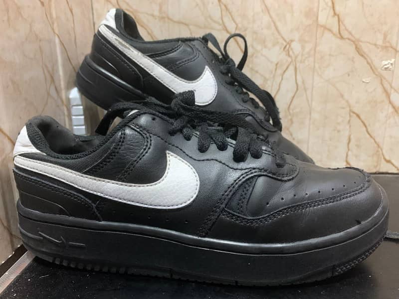 Nike. . . 1
