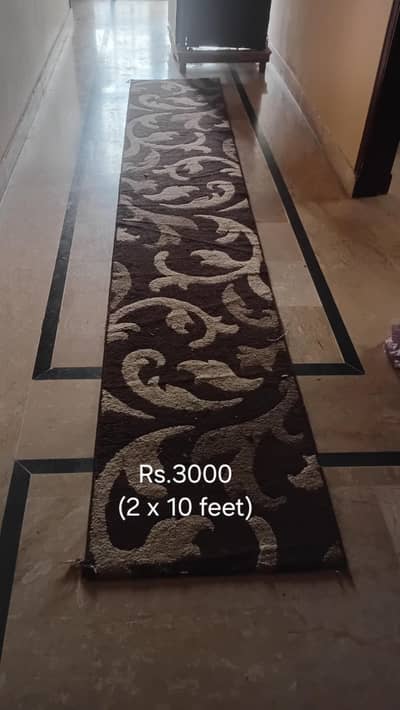 Delicate carpets and a runner