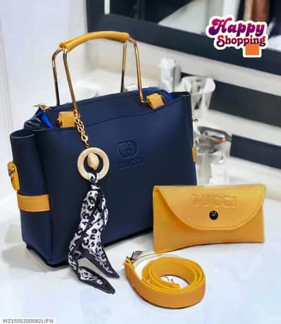 Navy blue handbag withwith mustard yellow wallet