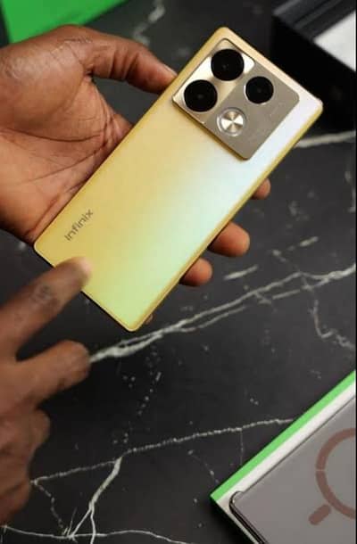 Infinix note 40 pro with wireless charger powerbank box available