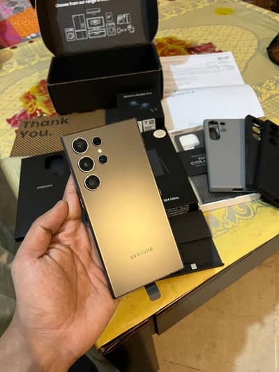 Samsung Mobile S24 Ultra pta approved with box braids urgent sale