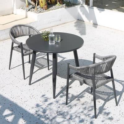 out door coffee table with chairs and center table