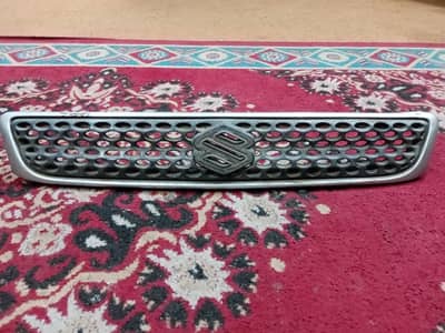 SUZUKI CULTUS GENUINE FRONT BOUNT GRILL