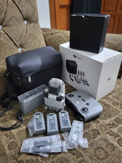 Dji mini 2 (Fly more combo) (10/10++) (Complete box)