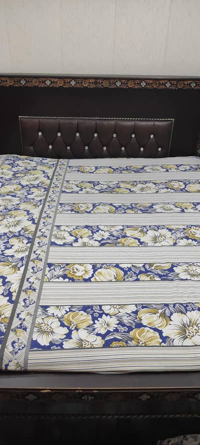 Double bed with matching dressing table for sale.