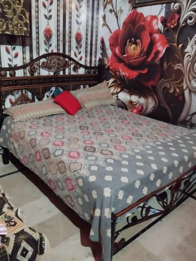 double bed with mattress and dressing table
