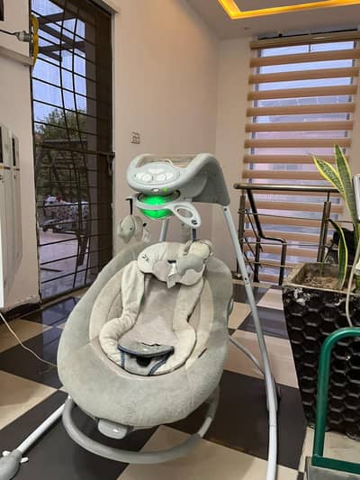 Ingenuity Electric Baby Swing with Music & Soothing Motions