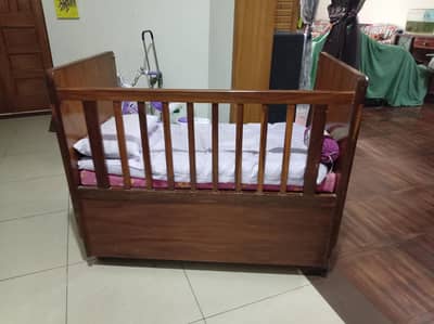 baby cot and high chair