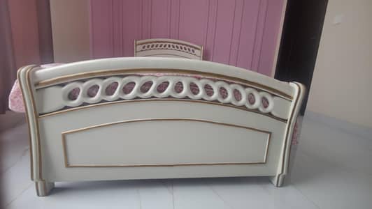 Solid wooden single bed. elegant white and gold finish