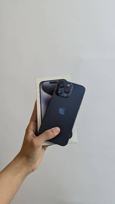 Apple iPhone 15 Pro Max with box and charger