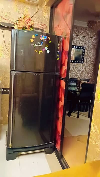 Dawlance double door refrigerator black colour excellent working cond