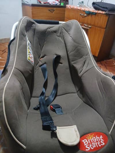 Bright starts Baby car seat/carry cot_ Like new (used twice only)