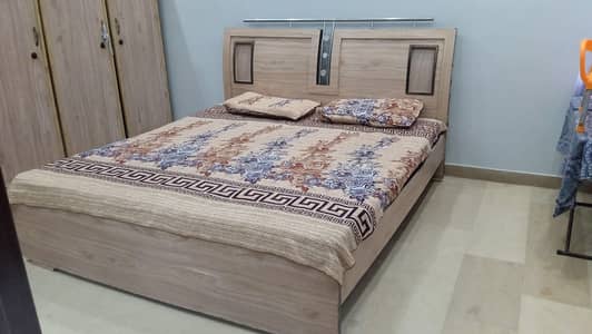 king size bed with matric and dressing table with wardrobes
