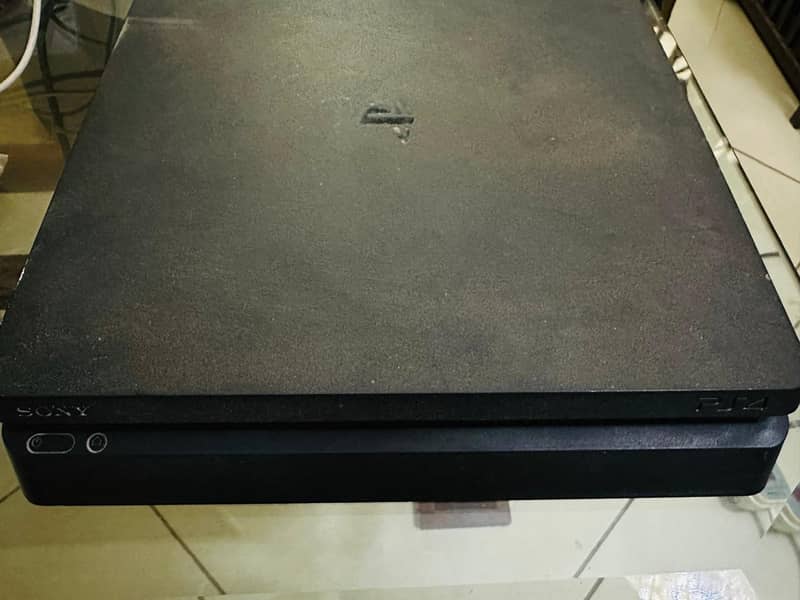 PS4 with two controllers 1