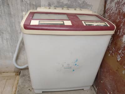 washer and dryer in running condition