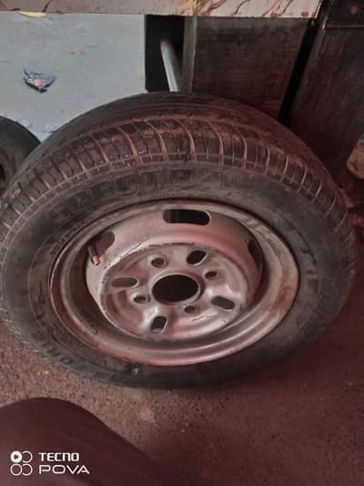 Mehran car tubeless tyre with orignal RiM. . . condition. . . 10/9. . . .