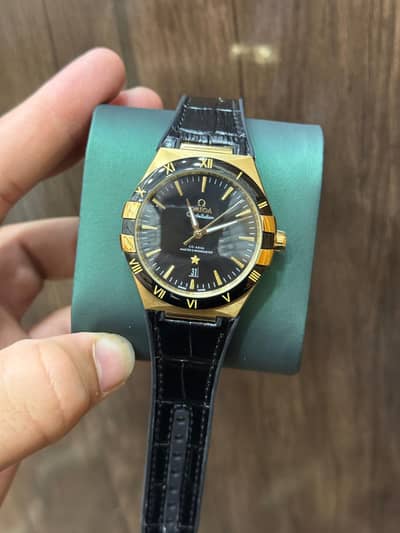 Omega constellation Co axial black yellow gold automatic
