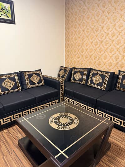 Black and gold sofas
