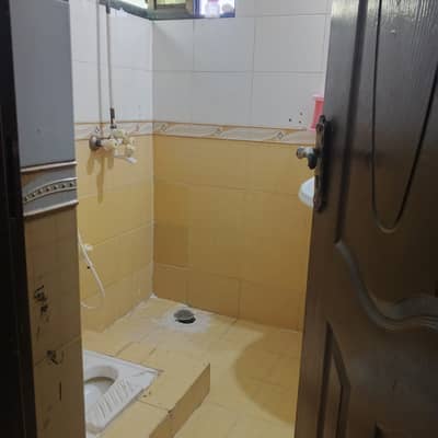 Johar town block R1 near Punjab college and park market
