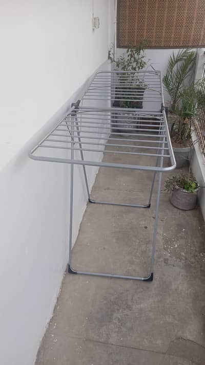 Drying clothes stand.
