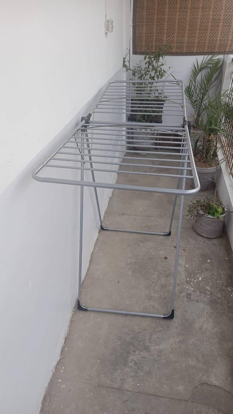 Drying clothes stand. 0