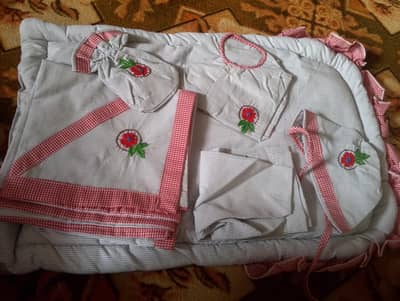 baby sleeping set pink wala hai Jis Mai gadda comforter pillow etc hai