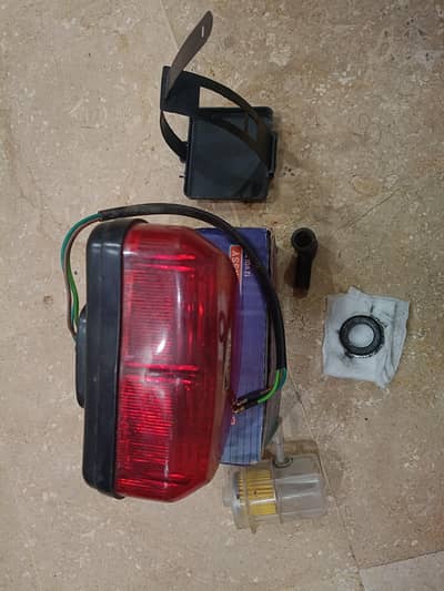 CD 70cc Genuine Back Light + (Meter Garari, Cap, Bat Holder, Filter]