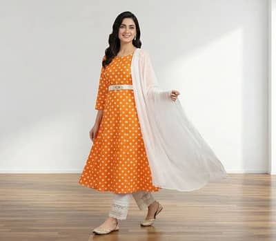 Orange polka dot kurta set with white shawl