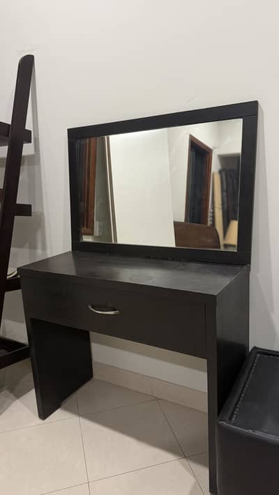 Black console table with mirror